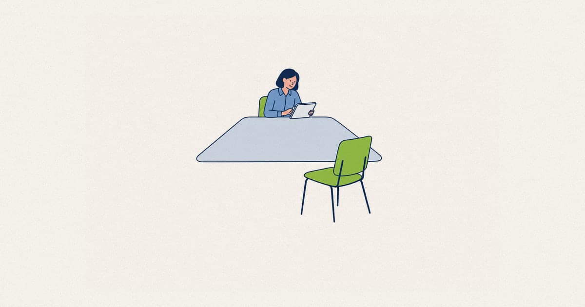 A candidate completing a psychometric test in a quiet meeting room