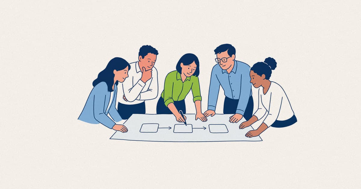 A leadership team building a plan during a strategic planning offsite